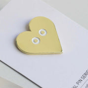 Pin badge, gold heart